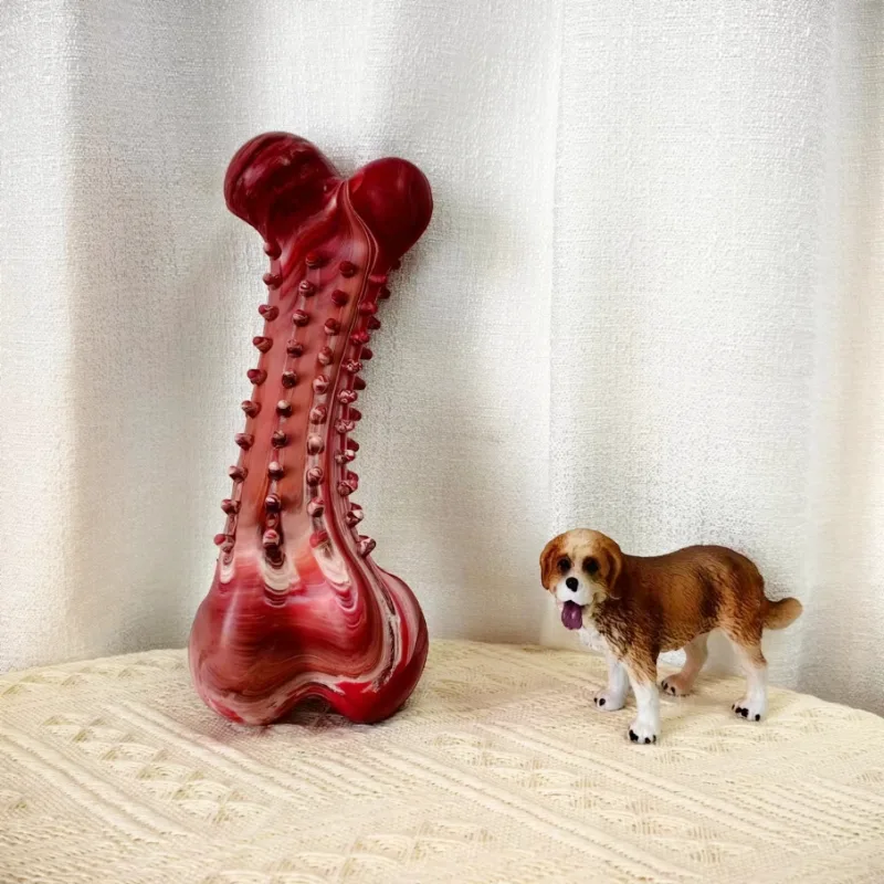 ゴム製の骨を噛む犬のおもちゃ